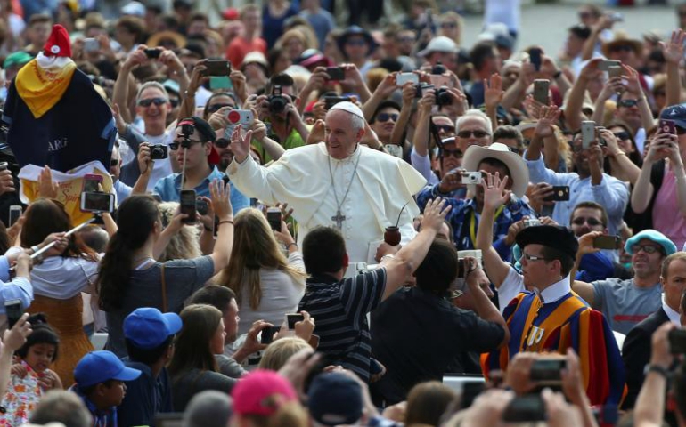 ope Francis waves as he arrives for his general audience June 7 in St. Peter's Square at the Vatican. (CNS/Alessandro Bianchi, Reuters)
