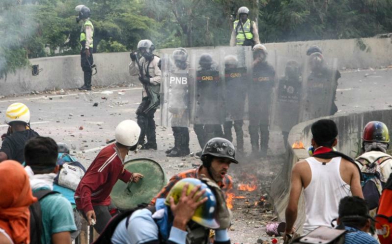 Protesters clash with police June 5 in Caracas, Venezuela. (CNS/Cristian Hernandez, EPA) 
