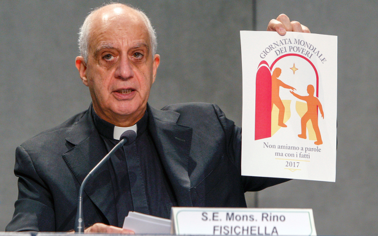 Archbishop Rino Fisichella, president of Pontifical Council for Promoting New Evangelization, speaks at the Vatican June 13 about the theme of the first World Day of the Poor, to be celebrated Nov. 19. (CNS/Robert Duncan)