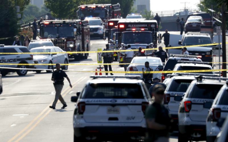 First responders are seen early June 14 after U.S. House Majority Whip Steve Scalise, R-La., was shot while practicing baseball, according to news reports. (CNS/Shawn Thew, EPA)
