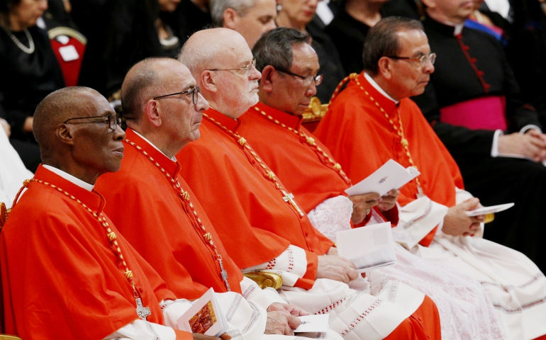 New cardinals, including Stockholm Cardinal Anders Arborelius, center, look on as Pope Francis leads a consistory in St. Peter's Basilica at the Vatican June 28. (CNS/Paul Haring)