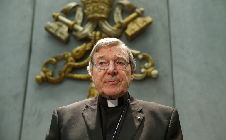 Australian Cardinal George Pell arrives to deliver a statement in the Vatican press office June 29. Speaking after Australian authorities filed sexual abuse charges against him, the cardinal denied all charges and told reporters he looks forward to having an opportunity to defend himself in court. (CNS/Paul Haring)