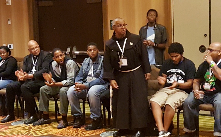 Auxiliary Bishop Fernand Cheri III of New Orleans speaks during a young adult forum at the National Black Catholic Congress in Orlando, Florida, July 6. (NCR photo/Gail DeGeorge)