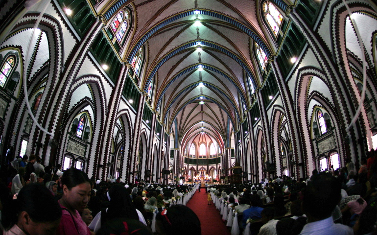 People gather inside St. Mary's Cathedral in 2011 in Yangon, Myanmar. Church sources say they expect Pope Francis to visit in late November. (CNS/EPA)