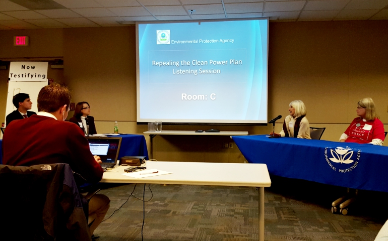 Two women, right, give their testimony to EPA panel members during a listening session on Donald Trump's proposal to repeal the Clean Power Plan, held in Kansas City, Missouri, Feb. 21. (GSR photo/Michele Morek)