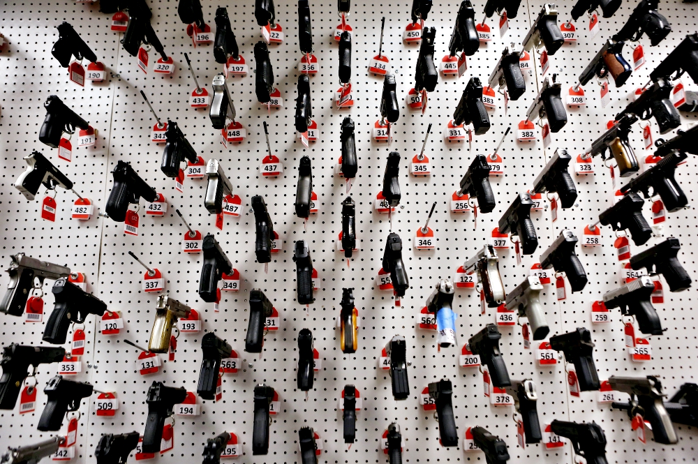 Handguns are seen in this 2013 file photo at the Bureau of Alcohol, Tobacco and Firearms National Laboratory Center in Beltsville, Maryland. (CNS/Reuters/Gary Cameron)
