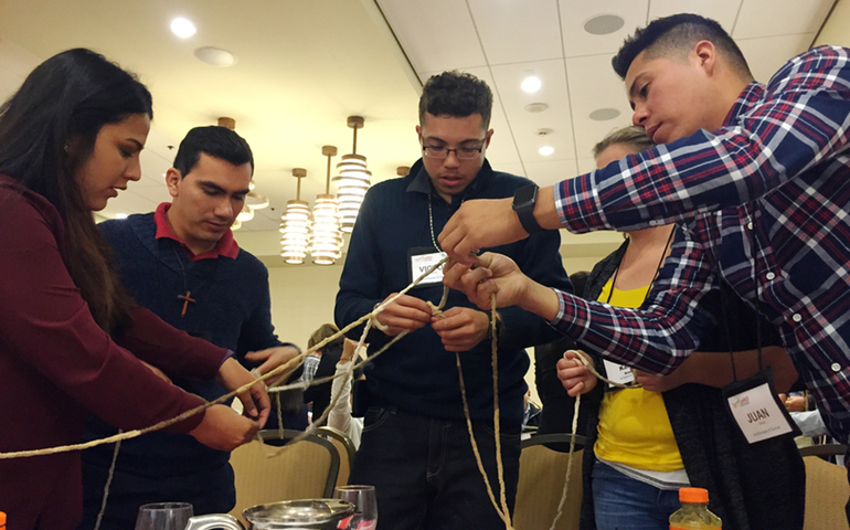 As a team-building exercise, La RED’s conference attendees were encouraged to a build a net – a red – on Oct. 22 in Seattle. (NCR photo/Soli Salgado)