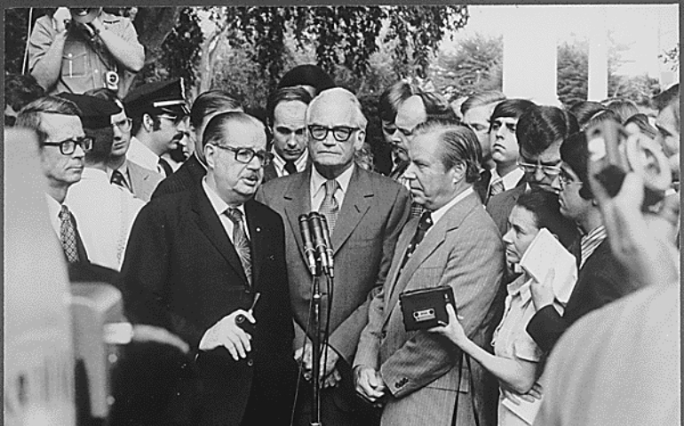 Rep. Hugh Scott, Sen. Barry Goldwater and Rep. John J. Rhodes speak to reporters after a meeting with President Richard Nixon about the Watergate situation, August 7, 1974. (National Archives/Oliver F. Atkins) 