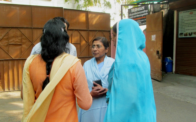 Holy Spirit Sr. Mary Stella interacts with HIV-positive persons at the Vishwas center in Indore, central India. (Saji Thomas)