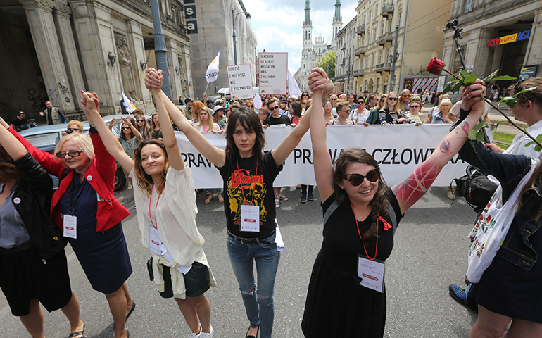 Pro-choice campaigners march against proposed changes to Poland's abortion law in Warsaw June 18. (AP Photo/Czarek Sokolowski)