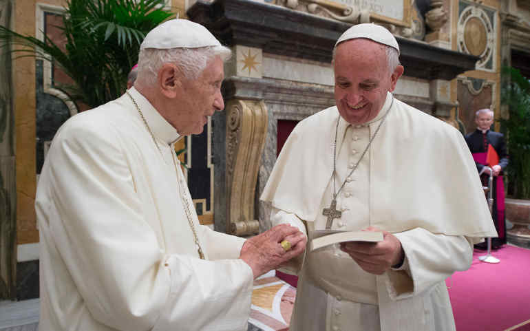 Pope Francis greets Pope Benedict June 28, the 65th anniversary of the retired pope's priestly ordination. (CNS/L'Osservatore Romano)