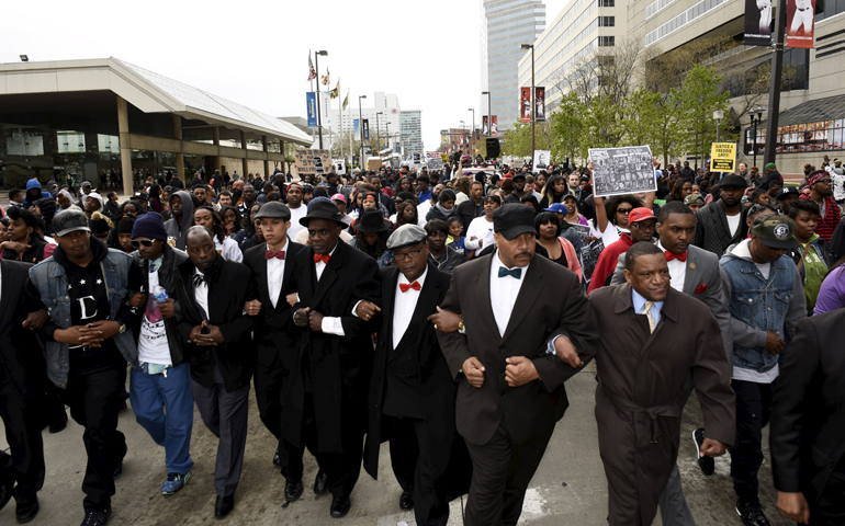 Demonstrators march to City Hall to protest the death of Freddie Gray on April 25 in Baltimore. (CNS/Reuters/Sait Serkan Gurbuz)    