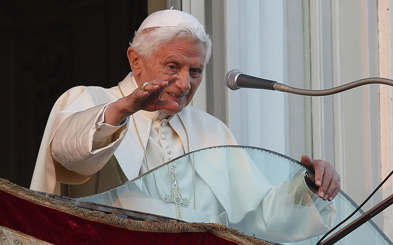 Pope Benedict XVI waves goodbye for the last time during his final public appearance from the balcony of the papal villa Feb. 28, 2013, in Castel Gandolfo, Italy. (CNS/Paul Haring)