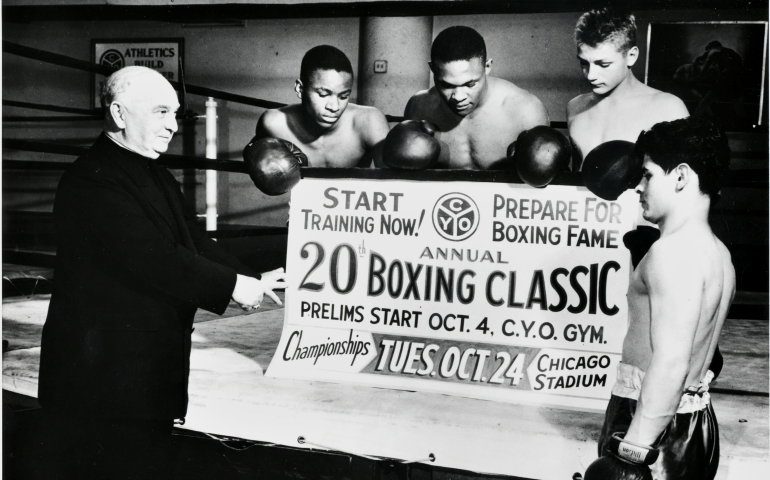 Bishop Bernard Sheil and boxers in a 1950 promotional shot for Catholic Youth Organization boxing championships (Archdiocese of Chicago’s Joseph Cardinal Bernardin Archives and Records Center)