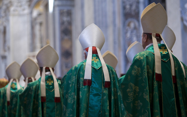 Bishops arrive for a Mass celebrated by Pope Francis to open the extraordinary Synod of Bishops on the family Oct. 5 in St. Peter's Basilica at the Vatican. (CNS/Maria Grazia Picciarella, pool) 