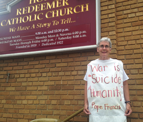 Kathy Boylan stands in front of Holy Redeemer Catholic Church in Washington, D.C. (Judy Coode)