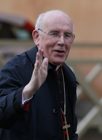Cardinal Sean Brady of Armagh, Northern Ireland, greets media before the March 2013 conclave that elected Pope Francis. (CNS/Paul Haring) 