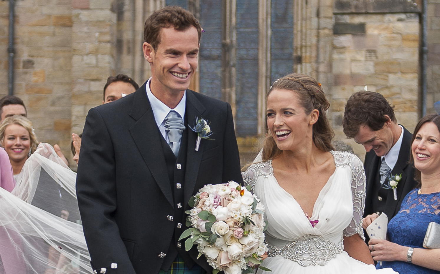 British tennis player Andy Murray and his wife, Kim, leave after their April 11 wedding ceremony at the cathedral in Dunblane, Scotland. (CNS/EPA/Joey Kelly)