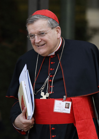 U.S. Cardinal Raymond Burke leaves the Oct. 7 morning session of the extraordinary Synod of Bishops on the family at the Vatican. (CNS/Paul Haring)