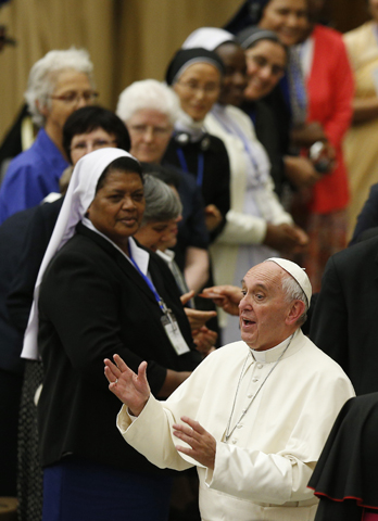 Pope Francis gestures during an audience with the heads of women's religious orders in Paul VI hall at the Vatican May 12. (CNS/Paul Haring)