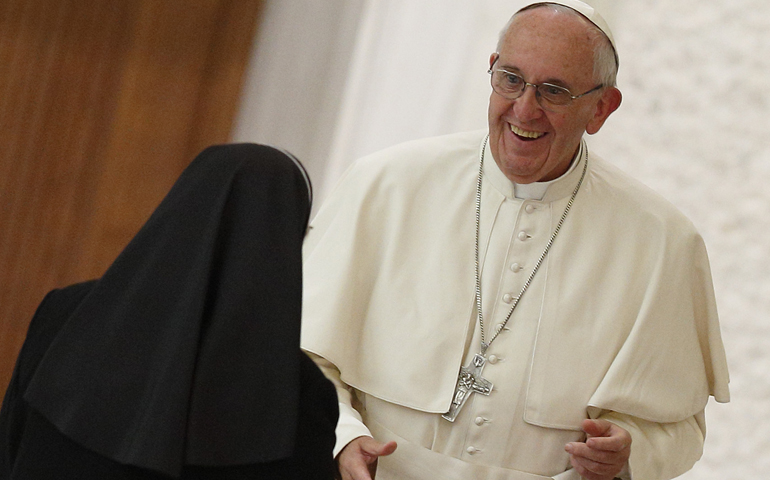 Pope Francis greets a nun during an audience with the heads of women's religious orders in Paul VI hall at the Vatican May 12. (CNS/Paul Haring)