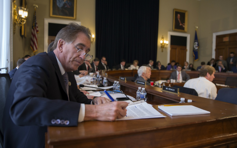 Congressman Jim Renacci, R-Ohio, takes notes as he listens to House Budget Committee lawmakers deliver statements on the American Health Care Act during a March 16 hearing on Capitol Hill in Washington. (CNS photo/Shawn Thew, EPA)