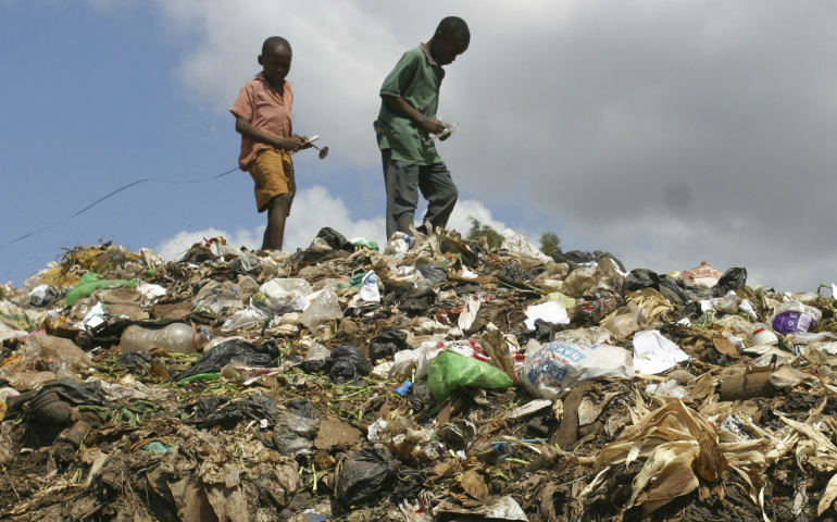 Children from a slum area scavenge through a garbage dump in Nairobi, Kenya, February, 2009. (CNS photo/Noor Khamis, Reuters)