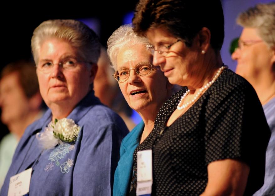 Current LCWR President Sr. Carol Zinn (left), a Sister of St. Joseph, stands with past presidents Franciscan Srs. Florence Deacon and Pat Farrell during the closing Mass at the organization's assembly in St. Louis on Aug. 10, 2012. (CNS photo/Sid Hastings)