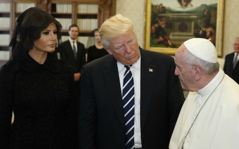 Pope Francis talks with U.S. President Donald Trump as they exchange gifts during a private audience at the Vatican May 24. (CNS photo/Paul Haring) 