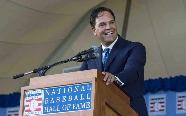 Mike Piazza makes his acceptance speech during the National Baseball Hall of Fame induction ceremony July 24 in Cooperstown, N.Y. The superstar catcher gave credit to his Catholic faith for his success in his life and career. (CNS photo/Gregory Fisher, USA Today Sports via Reuters)