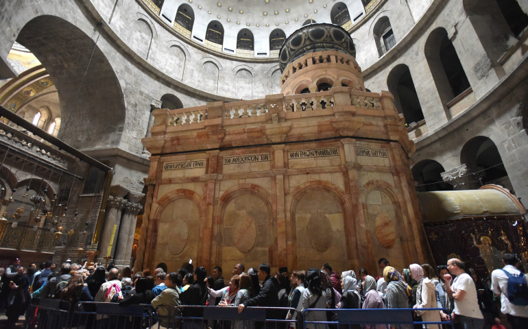 People wait to enter the Edicule, the traditional site of Jesus' burial and resurrection, March 23 at the Church of the Holy Sepulcher in Jerusalem. (CNS/Debbie Hill) 