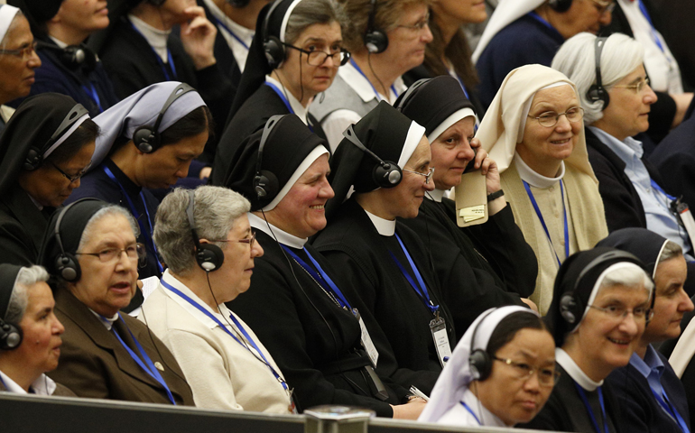 The heads of women's religious orders attend an audience with Pope Francis in Paul VI hall at the Vatican May 12. During a question-and-answer session with members of the International Union of Superiors General, the pope indicated his willingness to establish a commission to study whether women could serve as deacons. (CNS/Paul Haring)