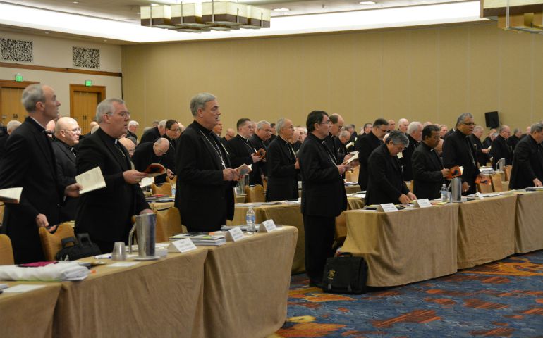 Bishops sing during afternoon prayer June 14 on the opening day of the U.S. Conference of Catholic Bishops' annual spring assembly in Indianapolis. (CNS photo/Sean Gallagher, The Criterion)