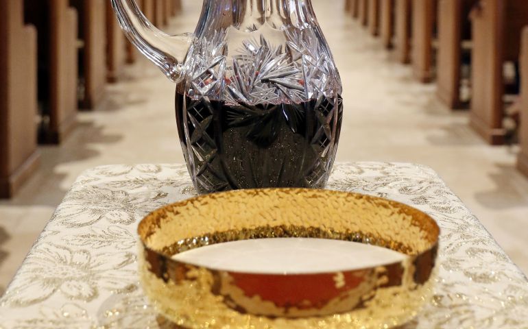 A ciborium containing hosts and a flagon of wine are seen during Mass April 23 at St. Therese of Lisieux Church in Montauk, New York. (CNS/Gregory A. Shemitz, Long Island Catholic) 