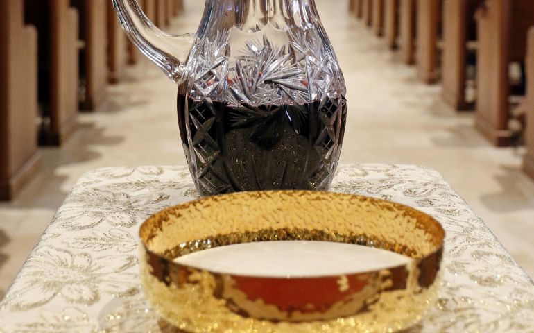 A ciborium containing hosts and a flagon of wine are seen during Mass April 23 at St. Therese of Lisieux Church in Montauk, New York. (CNS/Gregory A. Shemitz, Long Island Catholic)