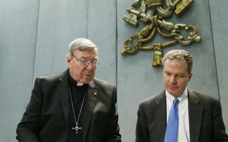 Australian Cardinal George Pell, left, leaves after delivering a statement in the Vatican press office June 29, with Greg Burke, Vatican spokesman, about sexual abuse charges against the cardinal. (CNS/Paul Haring)