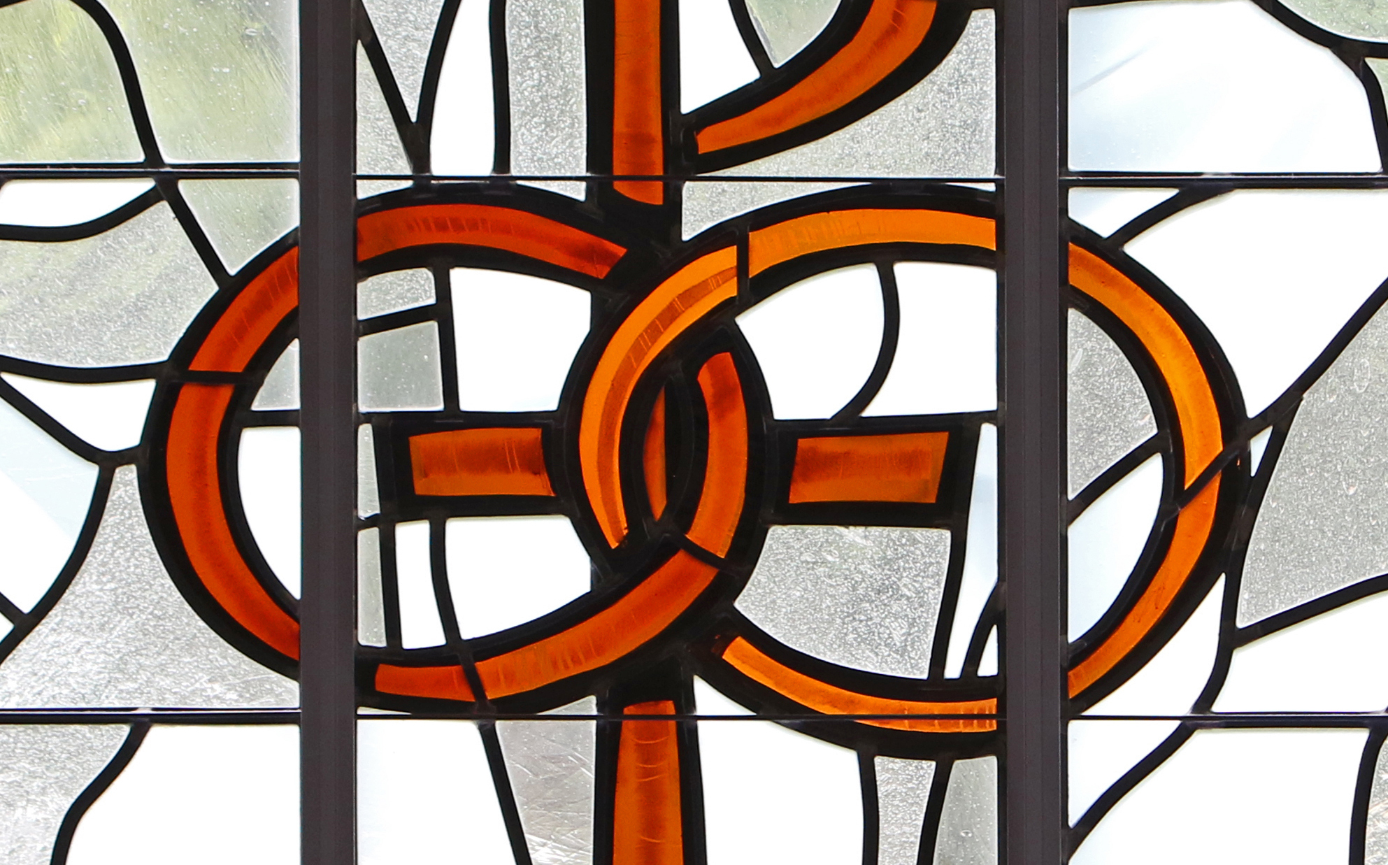 A pair of wedding bands symbolizing the sacrament of marriage is depicted in a stained-glass window in this CNS file photo. (CNS/Gregory A. Shemitz) 