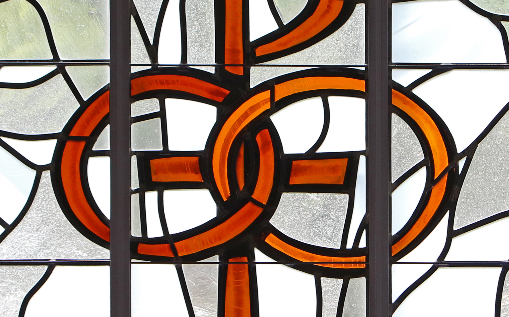 A pair of wedding bands symbolizing the sacrament of marriage is depicted in a stained-glass window in this CNS file photo. (CNS/Gregory A. Shemitz)