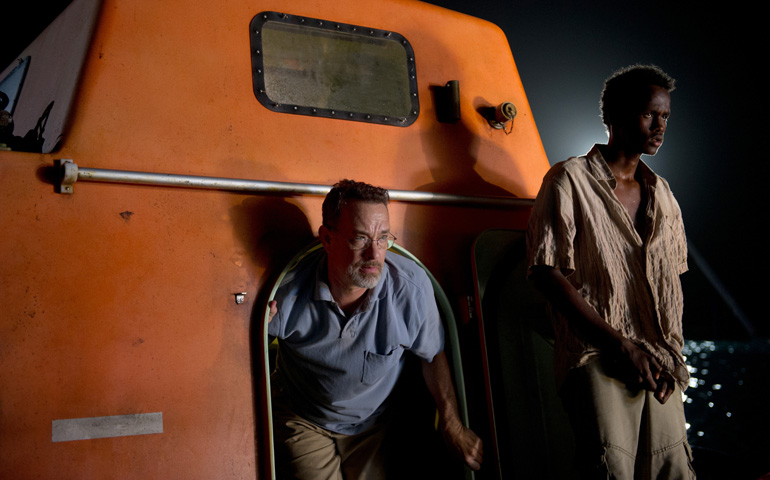 Tom Hanks, left, and Barkhad Abdirahman star in a scene from the movie "Captain Phillips." (CNS/Columbia) 