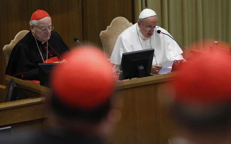 Pope Francis speaks during a meeting with cardinals and cardinals-designate Thursday in the synod hall at the Vatican. At left is Cardinal Angelo Sodano, dean of the College of Cardinals. (CNS/Paul Haring)