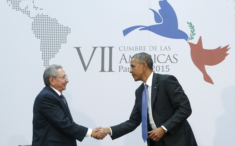 Cuba's President Raul Castro shakes hands with U.S. President Barack Obama as they hold a bilateral meeting Saturday during the seventh Summit of the Americas in Panama City. (CNS/Reuters/Jonathan Ernst)