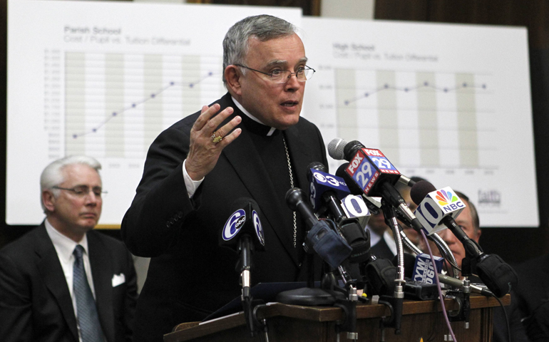Archbishop Charles Chaput makes remarks during a news conference to announce the closing of 48 Catholic schools at the archdiocesan headquarters in Philadelphia Jan. 6, 2012. (CNS/Reuters/Tim Shaffer)