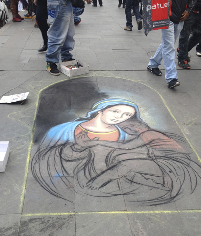 A chalk drawing of the Virgin and Child in downtown Santiago, Chile, where Catholic symbols are everywhere (Melinda Henneberger)