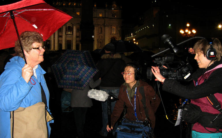 The filming crew of "Radical Grace" interview the author, left, in St. Peter's Square after Pope Francis was elected, March 13, 2013. (Courtesy of FutureChurch)