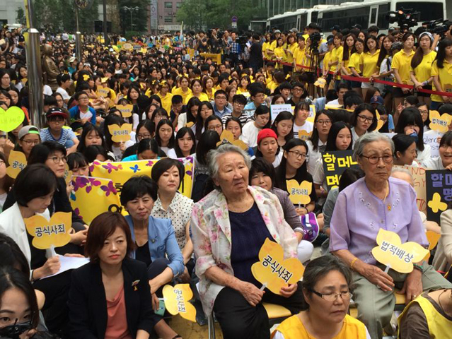 An estimated 2,000 people attended a rally Tuesday in Seoul, South Korea, in front of the Japanese embassy. (NCR Photo/Thomas C. Fox)