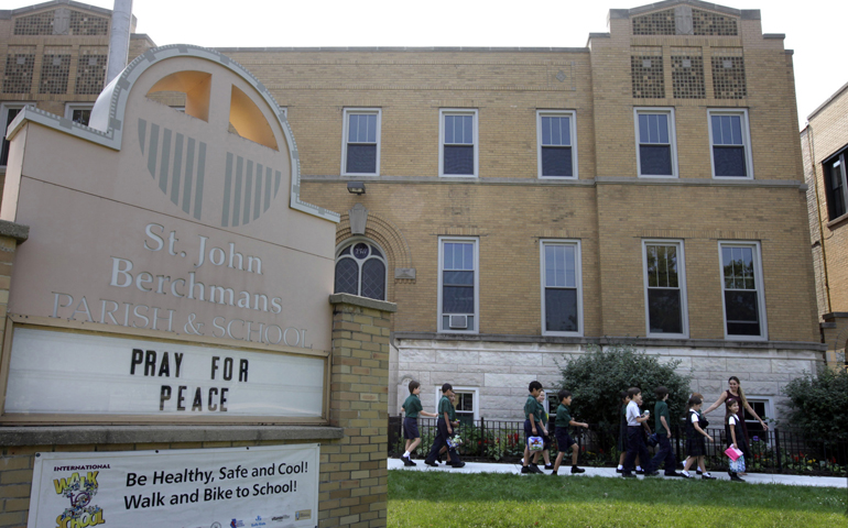 Third-graders at St. John Berchmans School in Chicago walk outside the school Sept. 6. Catholic schools in the archdiocese of Chicago are preparing to implement the Common Core State Standards. (CNS/Catholic News World/Karen Callaway)