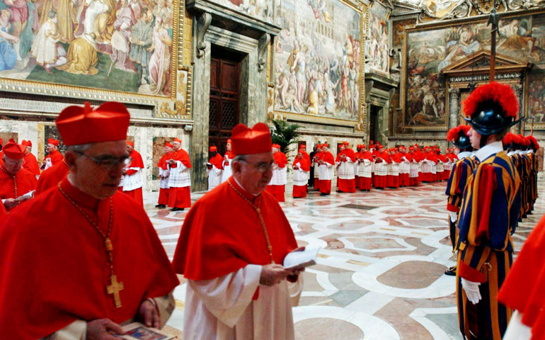 Cardinals process into the Sistine Chapel at the Vatican in 2005 while chanting the litany of saints as they begin the conclave to elect a new pope. (CNS/L'Osservatore Romano) 
