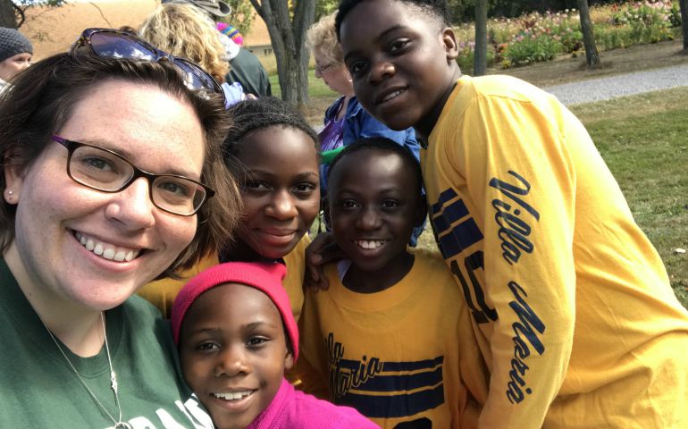 Sr. Eilis McCullough, left, poses with four siblings from the Democratic Republic of Congo who were enjoying Harvest Day at Villa Maria, the Sisters of the Humility of Mary motherhouse in Cleveland, Ohio. (Provided photo)