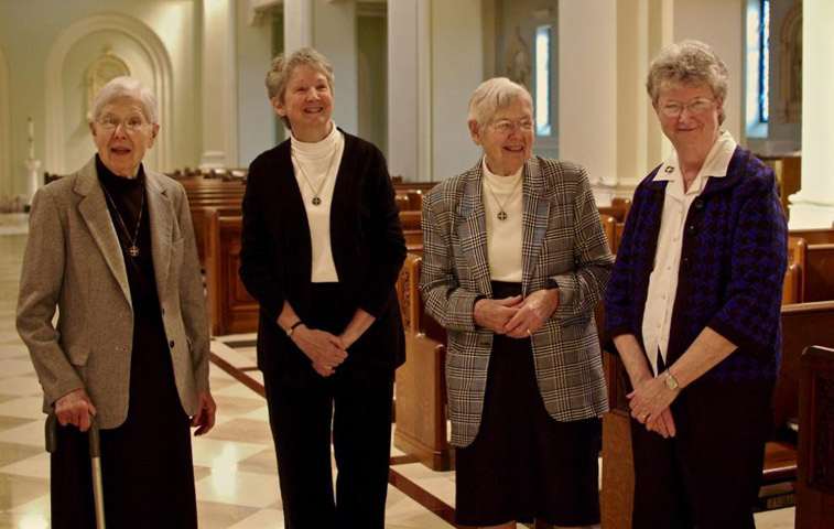 From left: Benedictine Srs. Mary Carmel Spayd, Rosemary Dauby, Mary Carmen Spayd and Agnes Marie Dauby talk about what it's like to have a sister at the same convent, the Immaculate Conception Monastery in Ferdinand, Ind. (GSR/Dan Stockman)