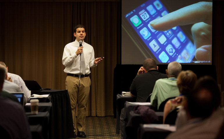 Brandon Vogt, author of "The Church and New Media," addresses the Catholic Media Conference on "The Seven Deadly Sins" of new media June 21 in Indianapolis. (CNS/Nancy Wiechec)